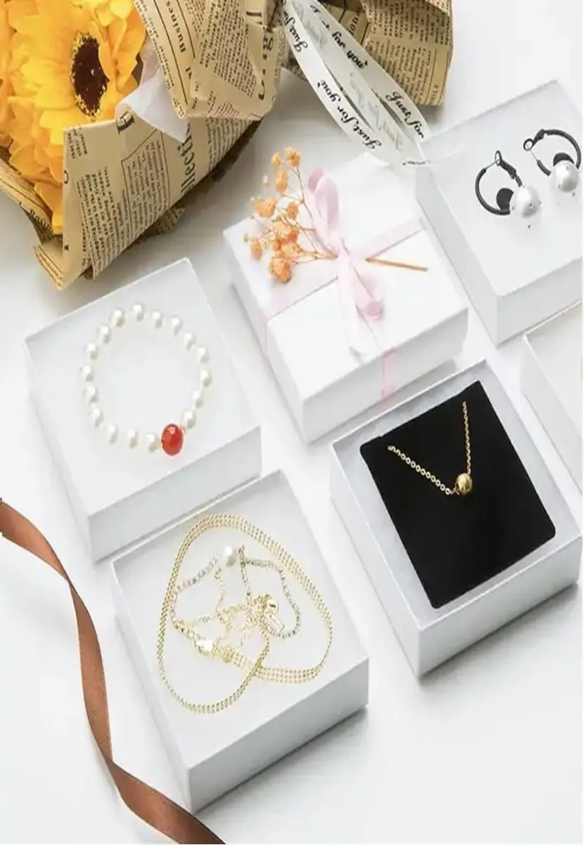 12 Pack Swirl White Cotton Filled Color Paper Cardboard Jewelry Box for Necklace, Ring, Earring, Pendant, Pocket Watch, Body Jewelry. Size-3 1/16" x 2 1/8" x 1" - by R J Displays