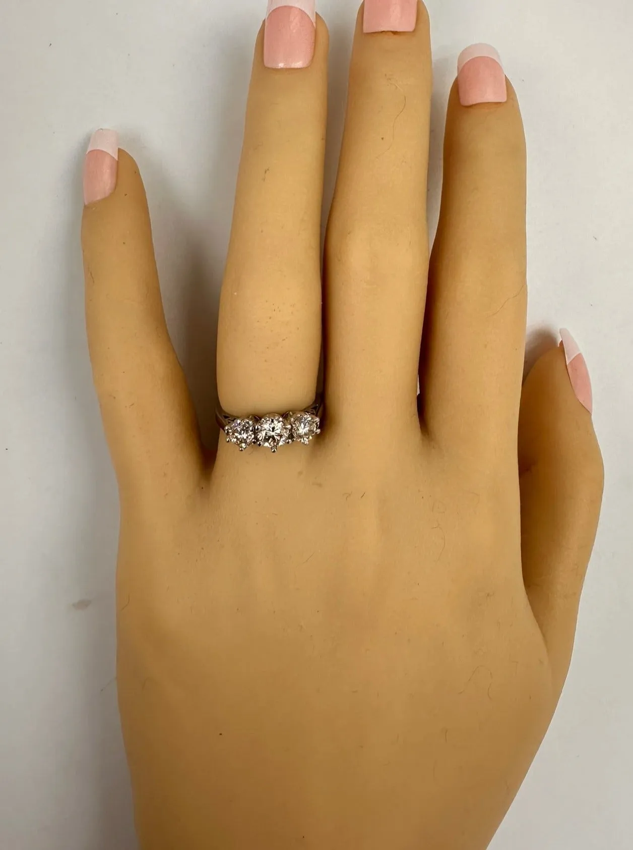 "Radiant Elegance: Exquisite 18ct White Gold Diamond Trilogy Ring"