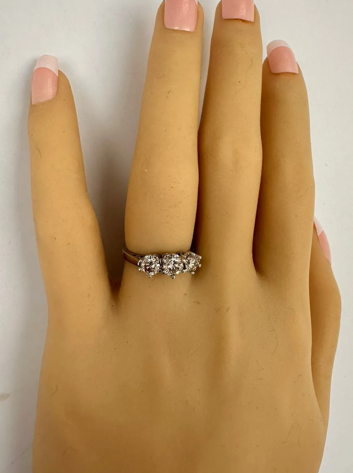 "Radiant Elegance: Exquisite 18ct White Gold Diamond Trilogy Ring"