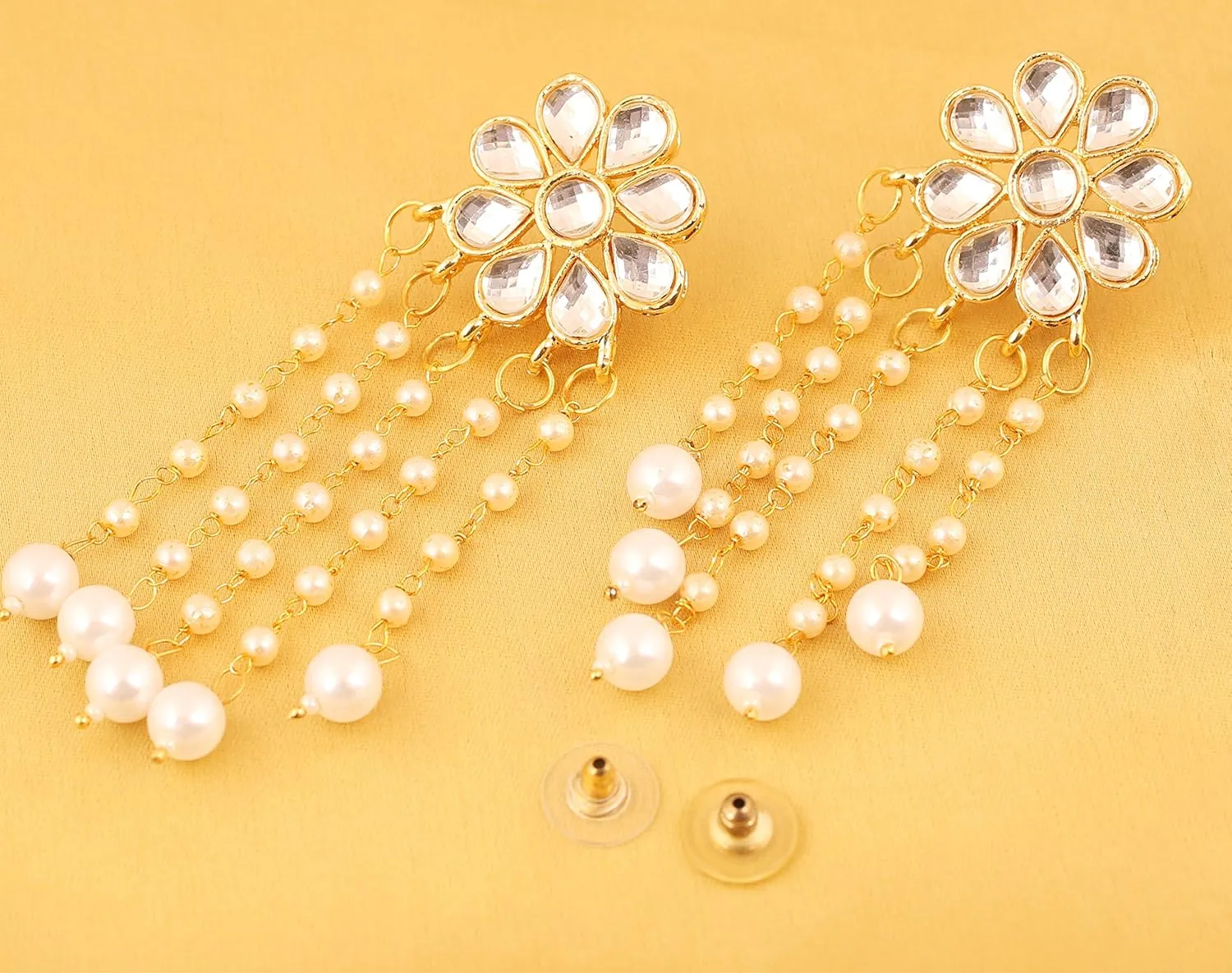 Touchstone Indian Bollywood Fashion Handmade Beautiful Cut Work Sparkling Rhinestone Faux Pearl Stylish Designer Jewelry Earrings for Women in Antique Gold or White Tone.