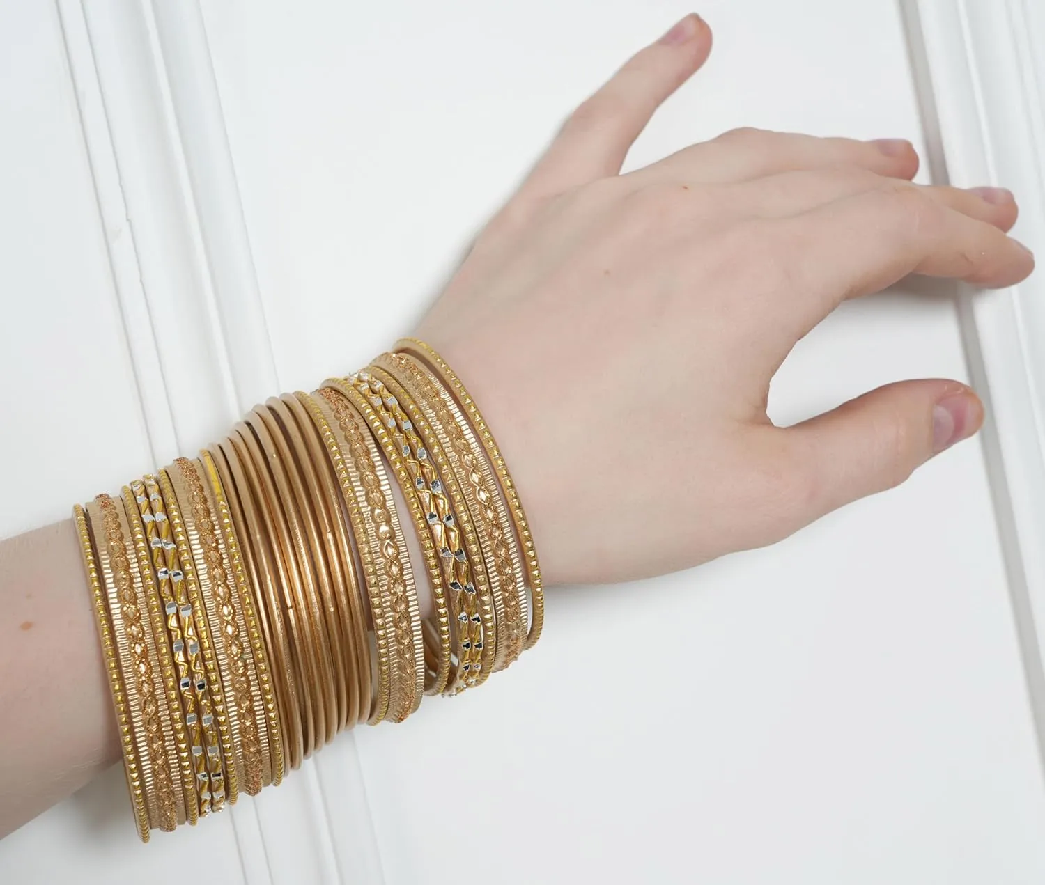 Touchstone Indian Metal Bangles for Women Gold Alloy Bracelets desi 2 Dozen Bangle Collection Bollywood Women's Jewelry Set Multi Stacking Wide Chunky Textured Golden Set of 24 in Gold or White Tone